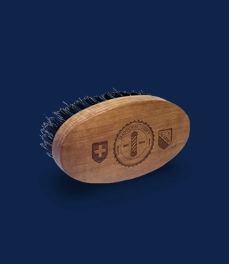 Traditional Zurich oval wooden beard brush with firm natural bristles, designed to nourish and add shine without greasiness.